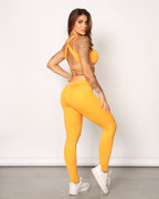 Conjunto flexible de cintura alta con bandeau en naranja y azul
